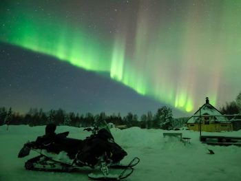 Hunting Aurora by Snowmobile with Photographer